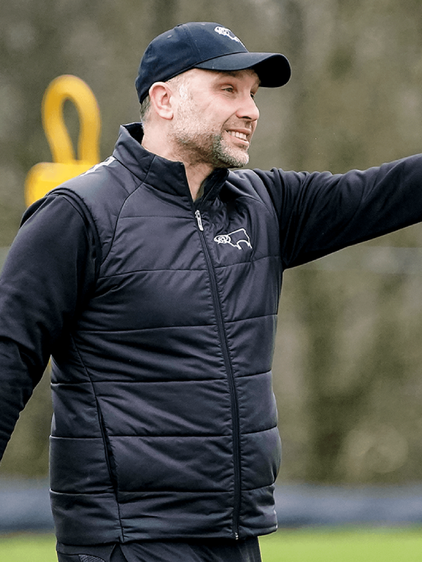 FootBall-Head-Coach-John-Eustace-Black-Vest